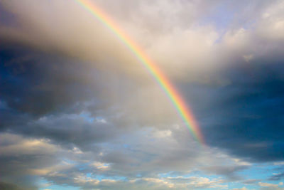 Low angle view of rainbow against sky
