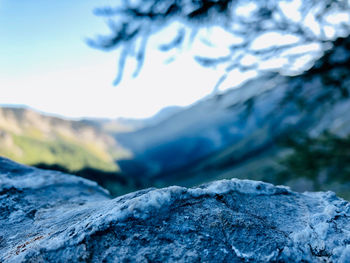 Close-up of snowcapped mountain against sky