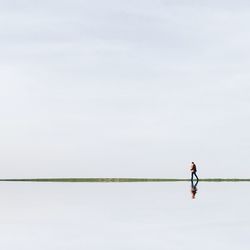 Full length of woman in pond