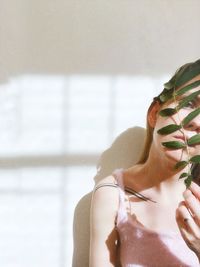 Cropped hand of woman with arms raised