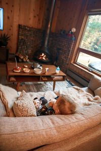 Boy sleeping on sofa