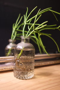 Close-up of glass of jar on table