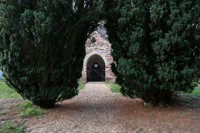 Entrance of temple against building