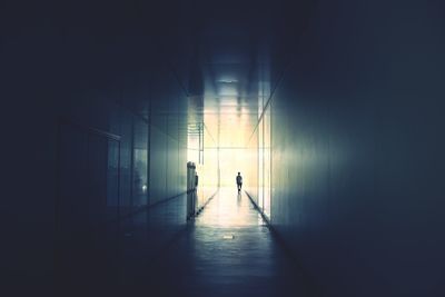 Full length of woman walking in corridor