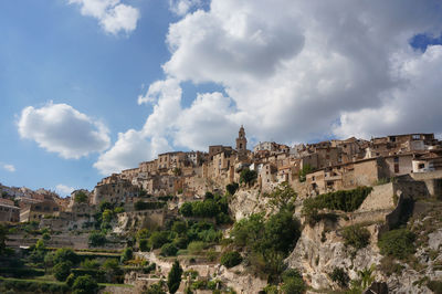 Old ancient town on hill white cloud blue sky