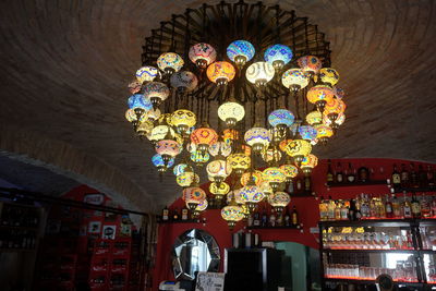 Low angle view of illuminated chandelier