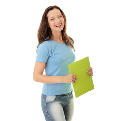 Portrait of a smiling young woman over white background