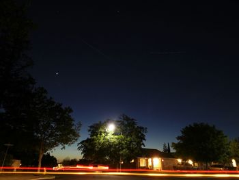 Light trails on street light at night