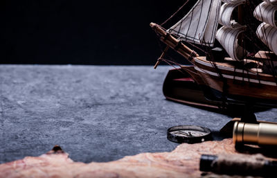 Close-up of boat on table in city
