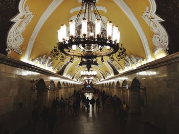 Group of people in illuminated building