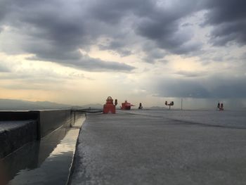 Scenic view of sea against cloudy sky