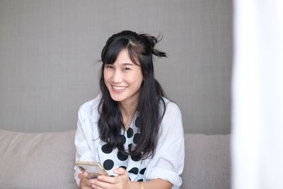 Portrait of a smiling young woman