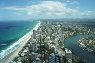 High angle view of city against cloudy sky