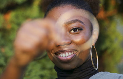 Portrait of smiling young woman