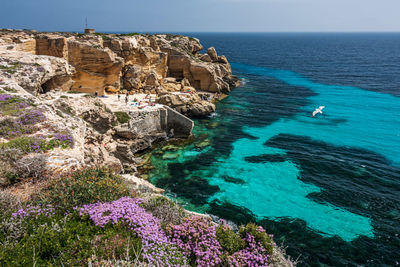 Panoramic view of sea and rocks in favignana