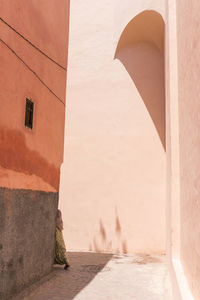 Narrow alley amidst buildings in city