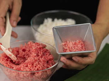 Process making red and white merah putih mini tumpeng same as indonesian national flag 