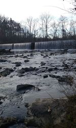 Scenic view of water against sky