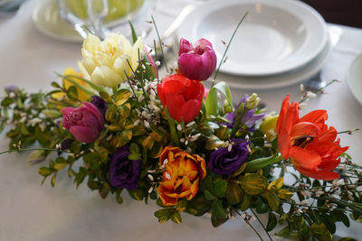 High angle view of multi colored flower bouquet on table