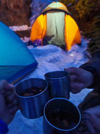 People holding coffee cup