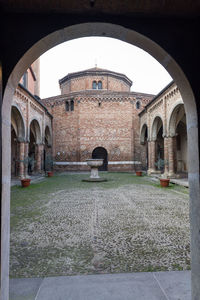 Historic building seen through arch