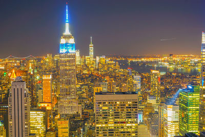 Illuminated buildings in city at night