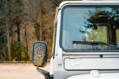 Old suv car in forest. off-road concept