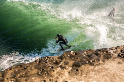 Man surfing in sea