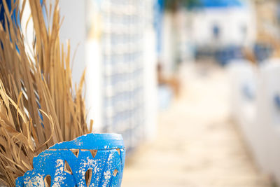 White and blue architecture on santorini island on blurred background traditional greek house 