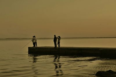 Scenic view of sea at sunset