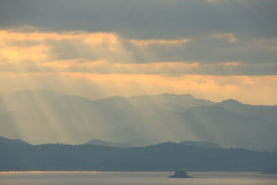 Scenic view of mountains against sky during sunset