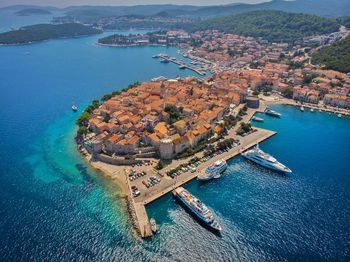 High angle view of city by sea