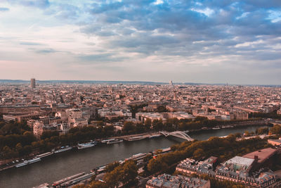 High angle view of river amidst buildings in city