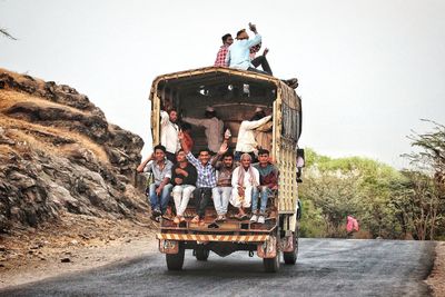 People on road against clear sky