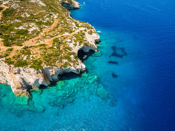 High angle view of rock in sea