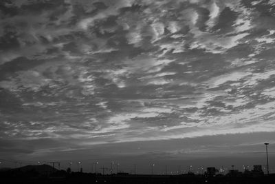 Low angle view of illuminated buildings against sky