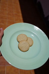 High angle view of cookies in plate on table