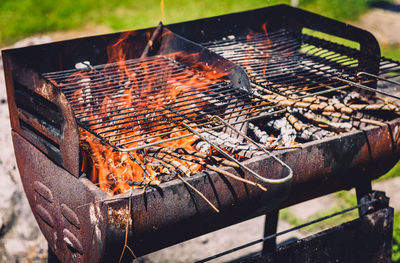 Close-up of barbecue grill in yard