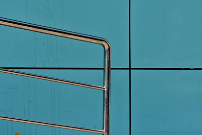 Stainless steel handrails on blue background