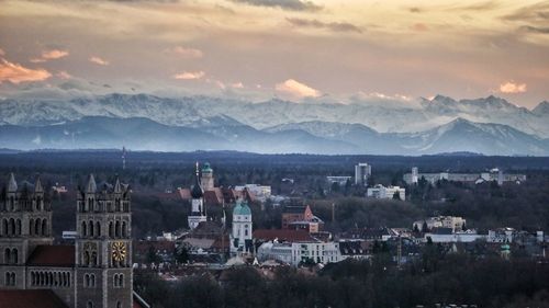 High angle view of town against cloudy sky