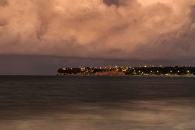 Scenic view of sea against sky at sunset