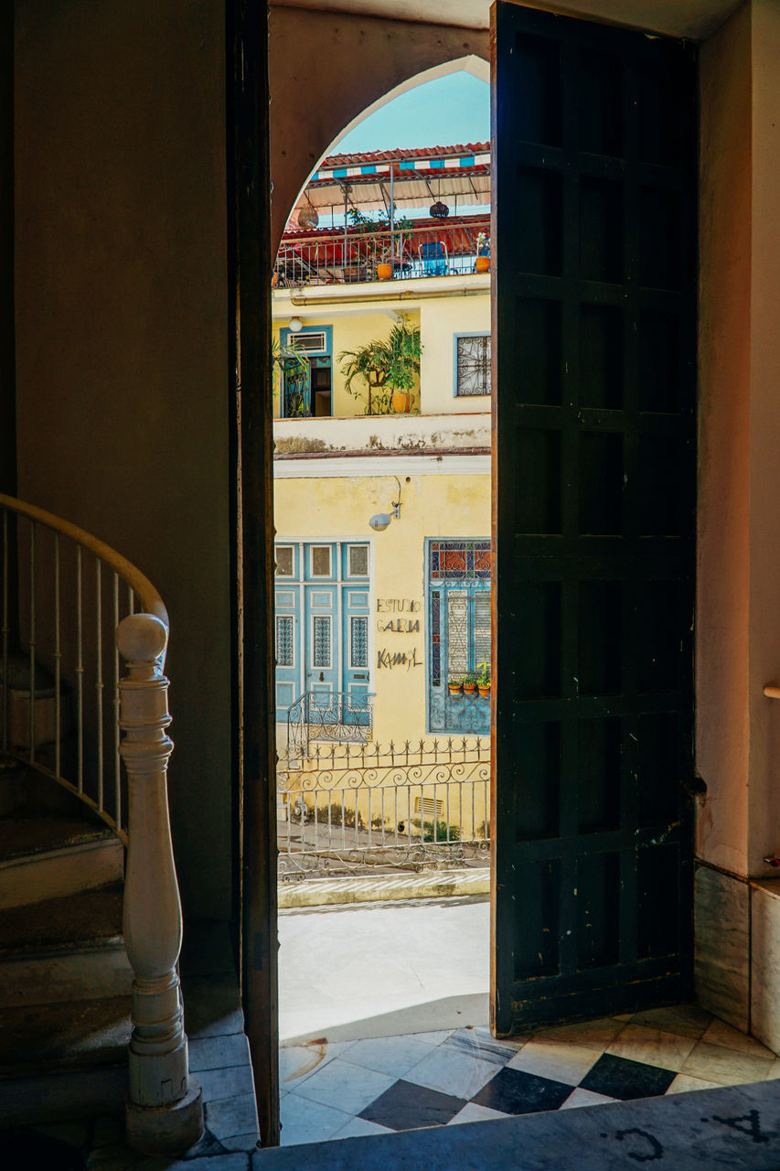 OPEN DOOR OF BUILDING