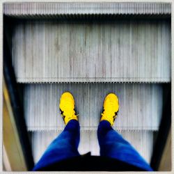 Low section of man standing on floor