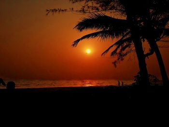 Scenic view of sea against sky at sunset