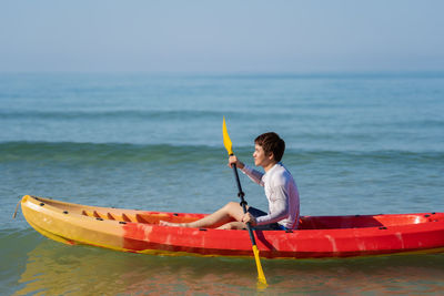 man paddling a