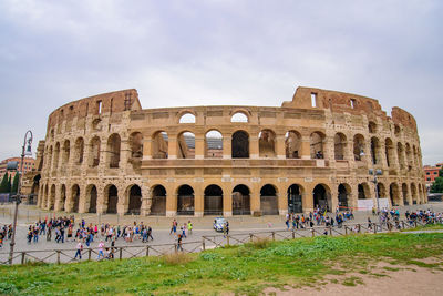 Group of people in front of historical building