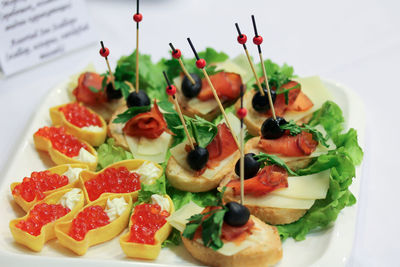 High angle view of fruits in plate on table