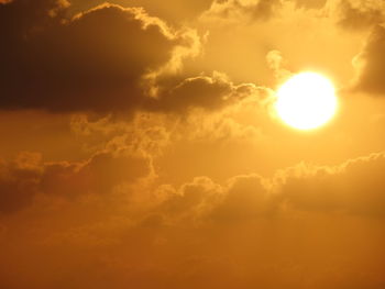 Scenic view of dramatic sky during sunset