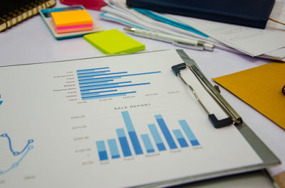 Close-up of documents on table