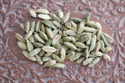 Close-up of cardamoms on table
